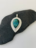Peruvian Opal sterling silver pendant with hand textured radiating line border