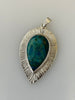 Peruvian Opal sterling silver pendant with hand textured radiating line border