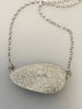 Back of Peruvian Opal silver necklace showing water inspired textured setting