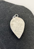 Back of teardrop Peruvian Opal silver pendant with water inspired hand textured finish