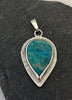 Teardrop Peruvian Opal sterling silver pendant with turquoise blue stone and radiating textured border